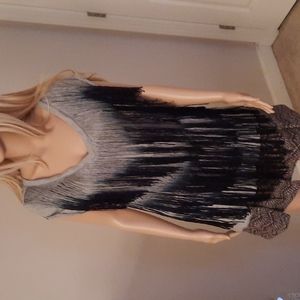 Gray v-neck shirt with gray and black fringes
